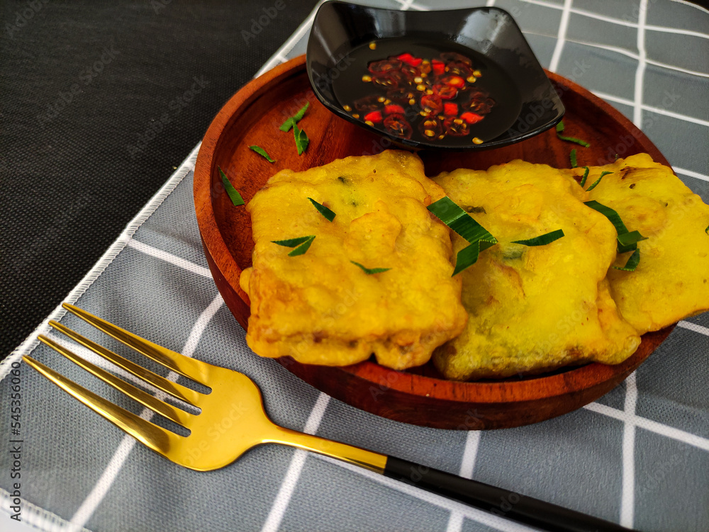 Mendoan, Indonesian traditional food. Tempe covered in flour, fried and