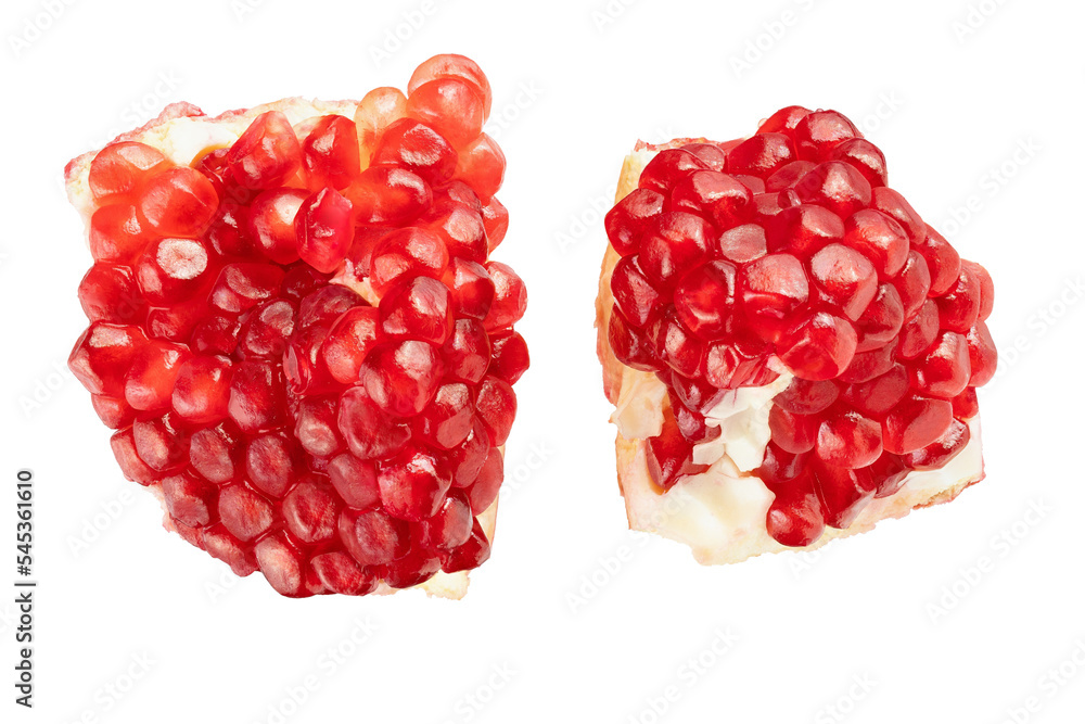 Half and piece of Pomegranate with seeds isolated on white background. With clipping path. Full depth of field. Focus stacking Half and piece of Pomegranate with seeds isolated on white background. With clipping path. Full depth of field. Focus stacking