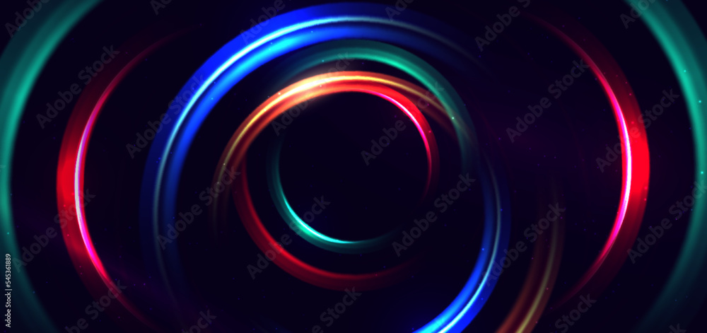 Abstract technology futuristic neon circle glowing blue, green and red light lines with speed motion blur effect on dark blue background. Abstract technology futuristic neon circle glowing blue, green and red light lines with speed motion blur effect on dark blue background.