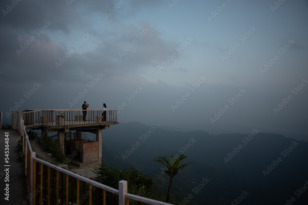 People enjoying on a mountain view point in the afternon