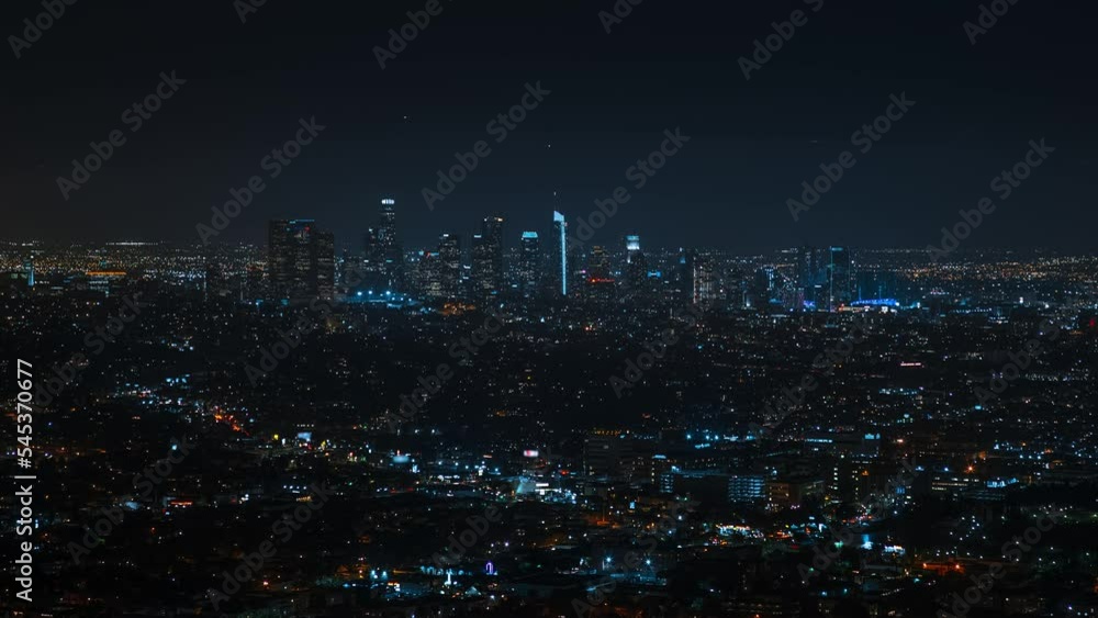 Timelapse of Los Angeles downtown at night. Big city in the USA Timelapse of Los Angeles downtown at night. Big city in the USA