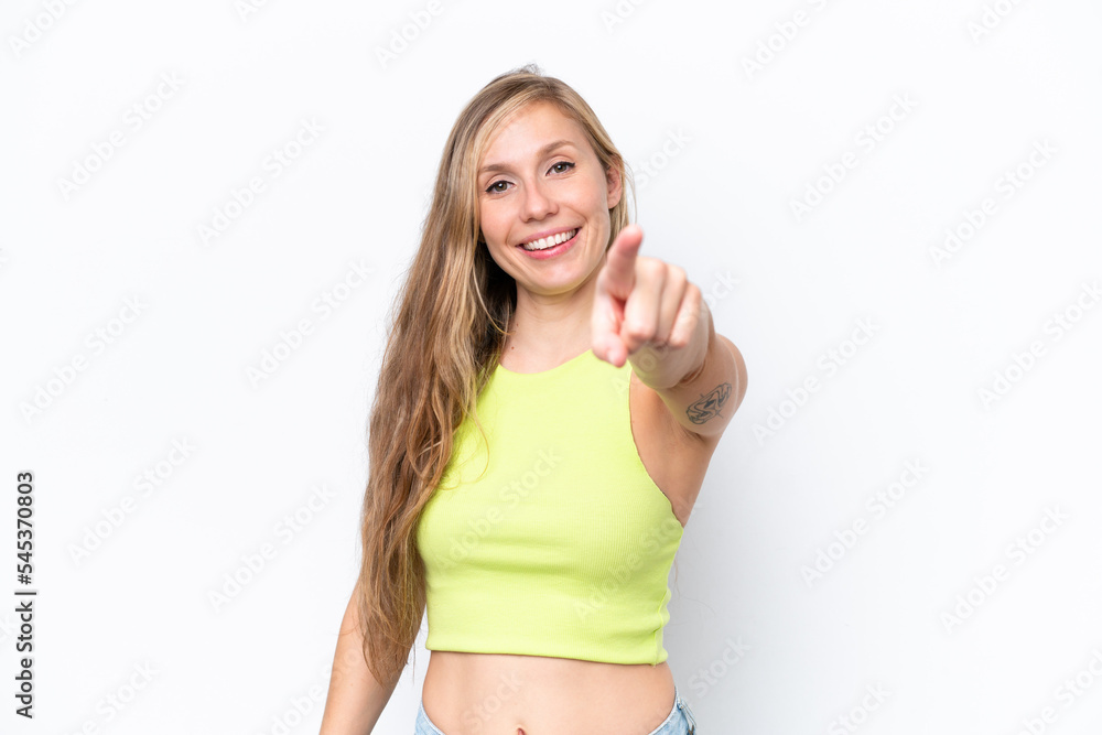 Young caucasian woman isolated on white background surprised and pointing front Young caucasian woman isolated on white background surprised and pointing front