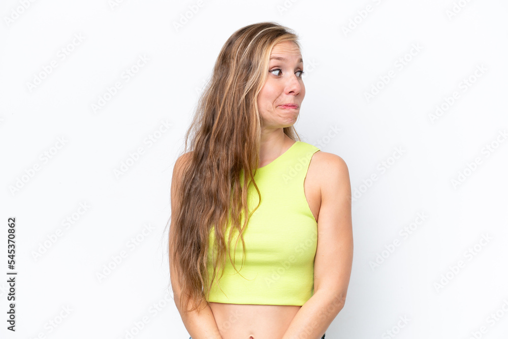 Young caucasian woman isolated on white background making doubts gesture looking side Young caucasian woman isolated on white background making doubts gesture looking side