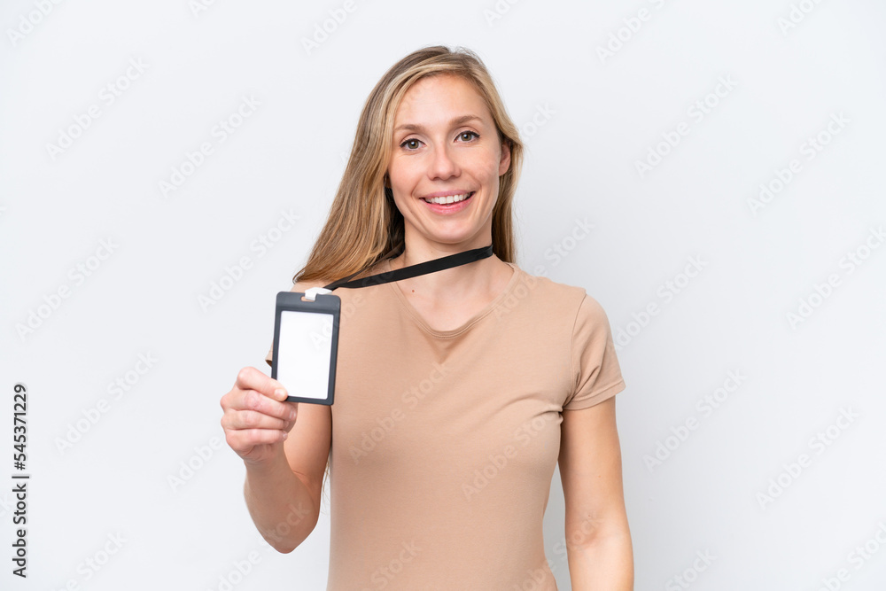 Young blonde woman with ID card isolated on white background smiling a lot Young blonde woman with ID card isolated on white background smiling a lot