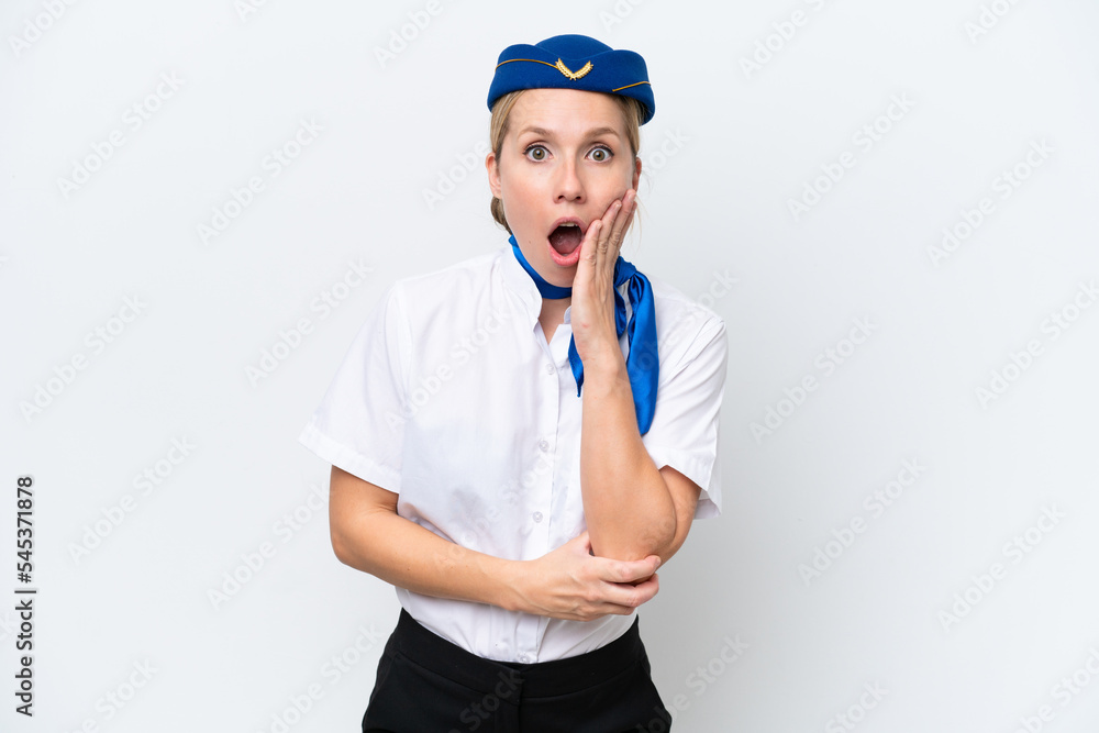 Airplane blonde stewardess woman isolated on white background surprised and shocked while looking right Airplane blonde stewardess woman isolated on white background surprised and shocked while looking right