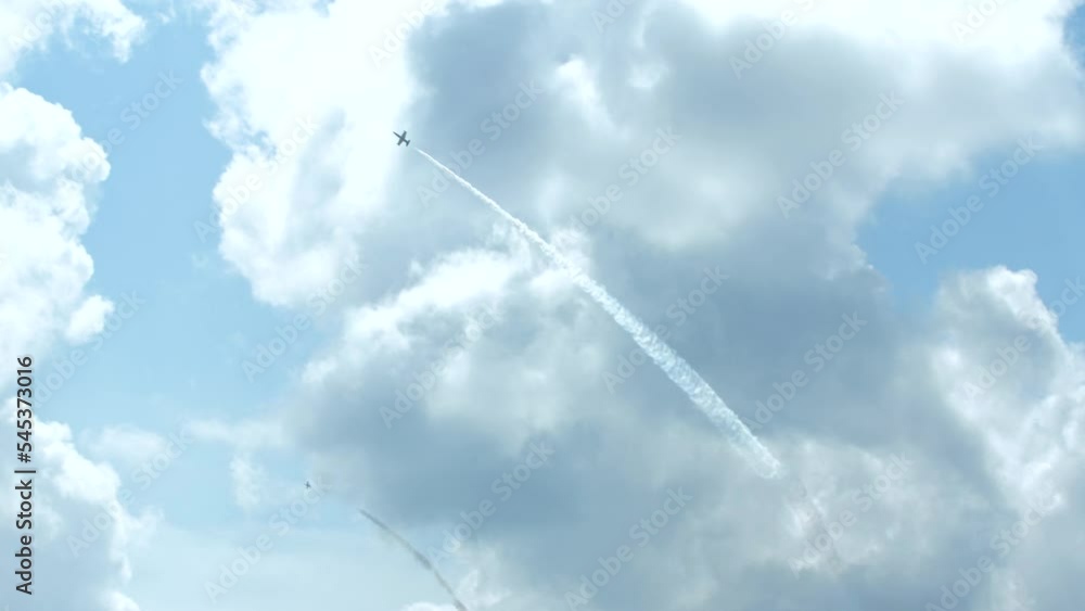 Planes at the airshow show different aerobatics Planes at the airshow show different aerobatics
