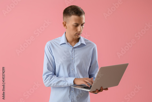 Thoughtful young man using ...