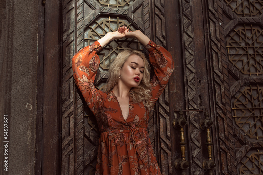 Young blonde woman in autumn city Young blonde woman in autumn city