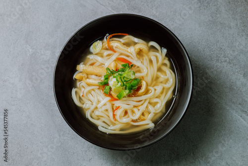 Kalguksu, Korean style noodle soup :Fresh knife-cut noodles, made by rolling flour dough and slicing into thin noodles, cooked in anchovy sauce. Zucchini, potatoes, and seafood may beadded.
