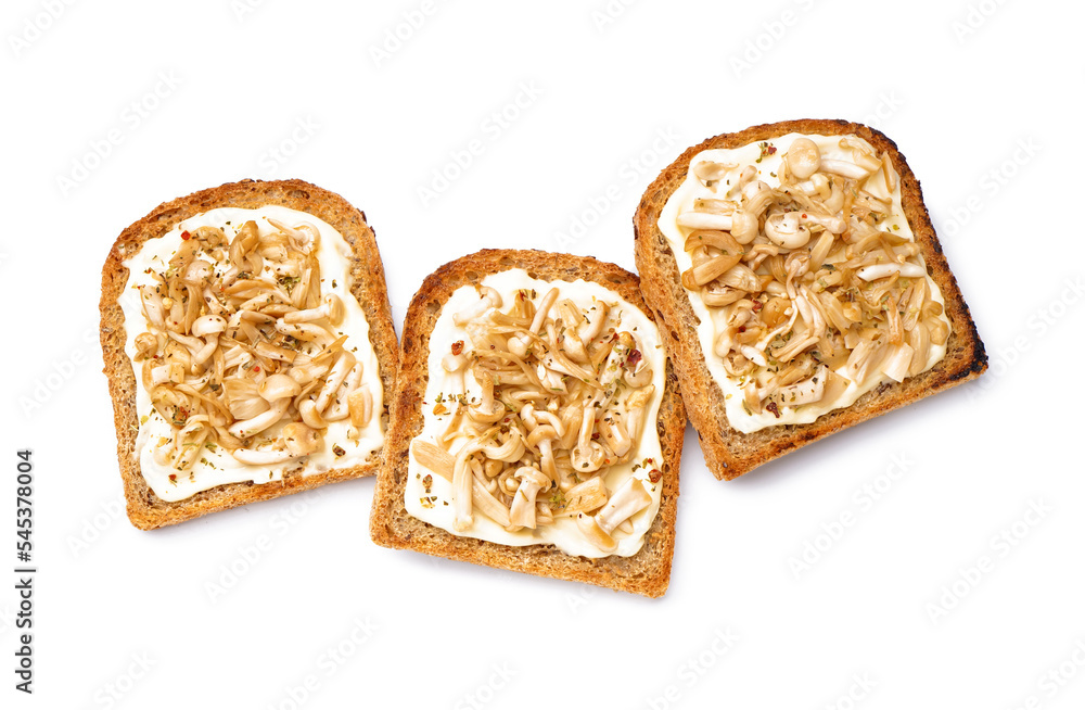 Tasty toasts with cream cheese and mushrooms on white background Tasty toasts with cream cheese and mushrooms on white background