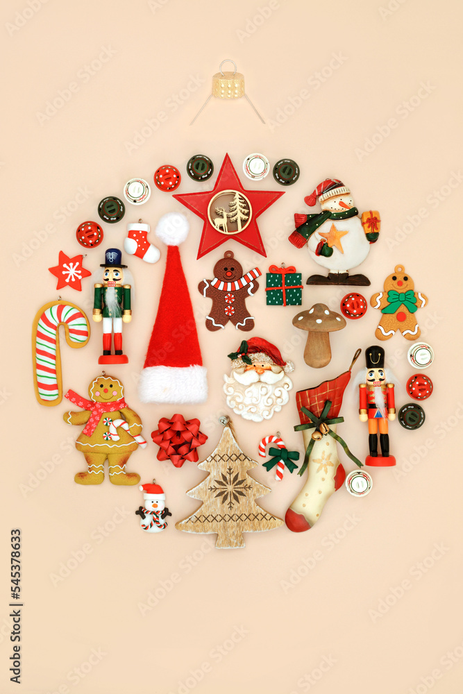 Eco friendly retro Christmas tree decoration concept round shape with traditional food, symbols, ornaments and decorations made of metal and wood. Festive abstract composition on cream.
