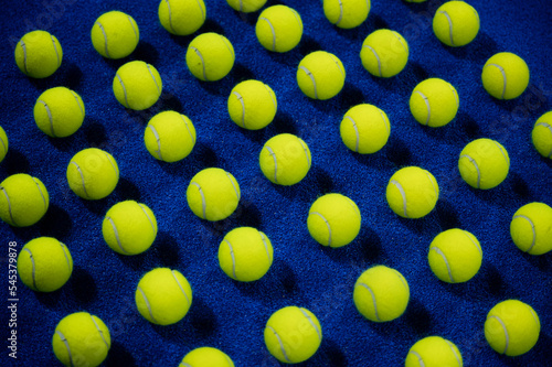 Combination of padel balls on the court