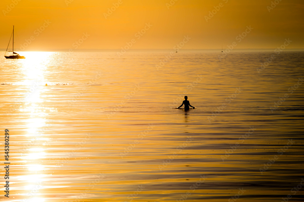 ocean boy in sunset light