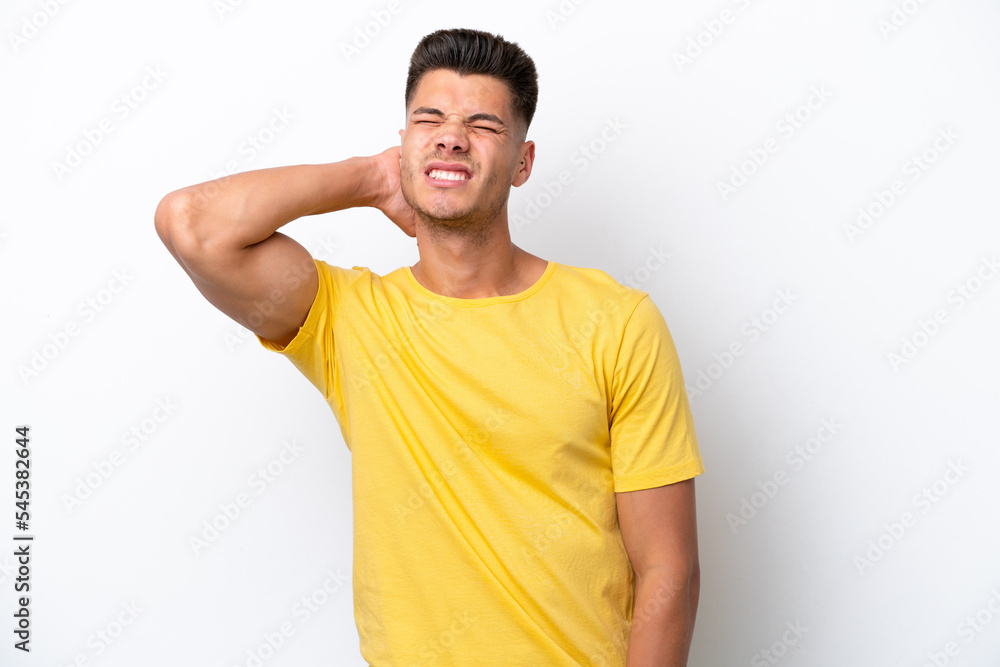 Young caucasian man isolated on white background with neckache Young caucasian man isolated on white background with neckache