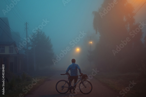 cycling on a foggy morning, morning walk in the village by bike