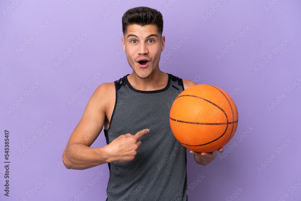 young caucasian woman basketball player man isolated on purple background with surprise facial expression young caucasian woman basketball player man isolated on purple background with surprise facial expression
