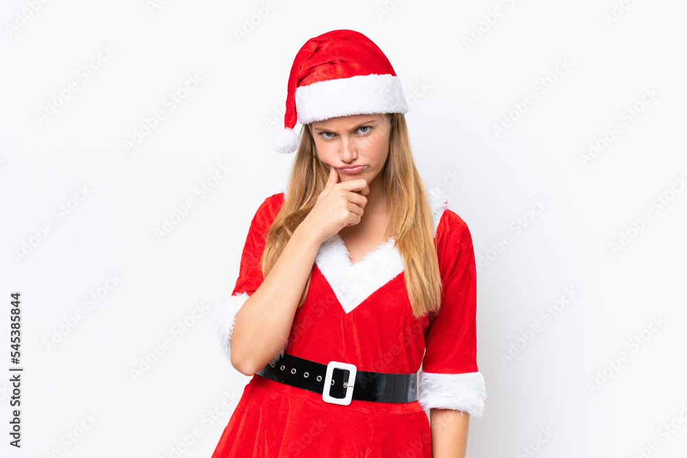 Young caucasian woman dressed as mama noel isolated on white background thinking Young caucasian woman dressed as mama noel isolated on white background thinking