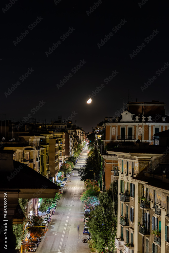 The moon at night over Via Tagliamento, Rome, Italy