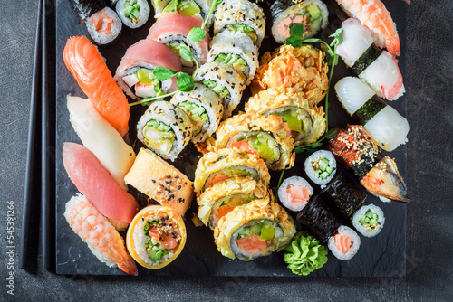 Tasty and fresh sushi set made of seafood and vegetables.