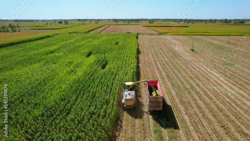 Aerial photography of corn harvester harvesting in Hohhot, Inner Mongolia, China photo