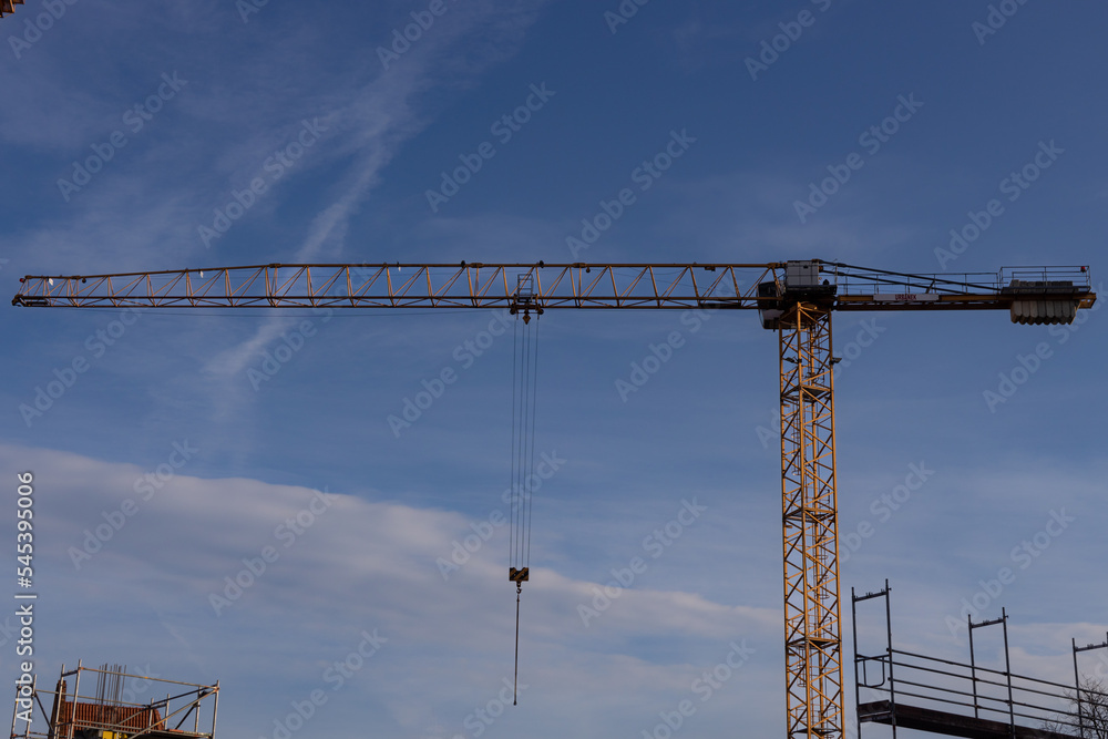 construction crane against blue sky