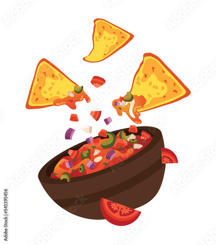 Nachos dipped in Salsa Overload