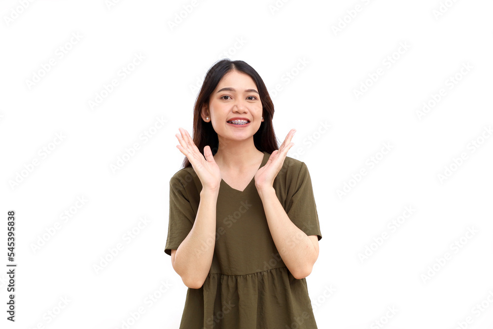 Happy Excited beautiful young asian woman standing with amazed or wow expression. Isolated on white Happy Excited beautiful young asian woman standing with amazed or wow expression. Isolated on white