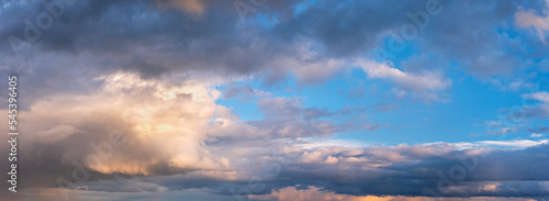 Beautiful panoramic evening sky with dramatic clouds after thunderstorm