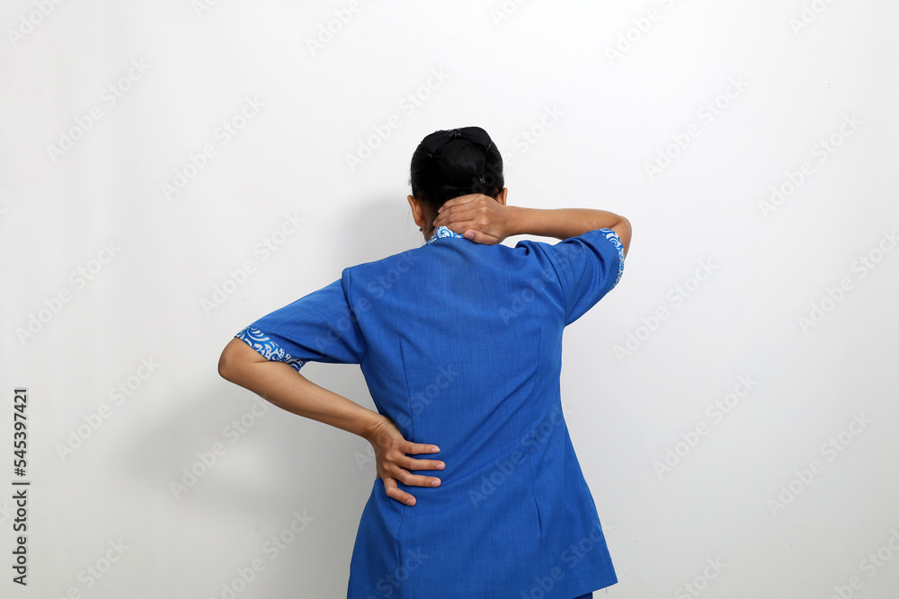 Back view of asian employee with back pain and problem with her neck. Isolated on white background Back view of asian employee with back pain and problem with her neck. Isolated on white background