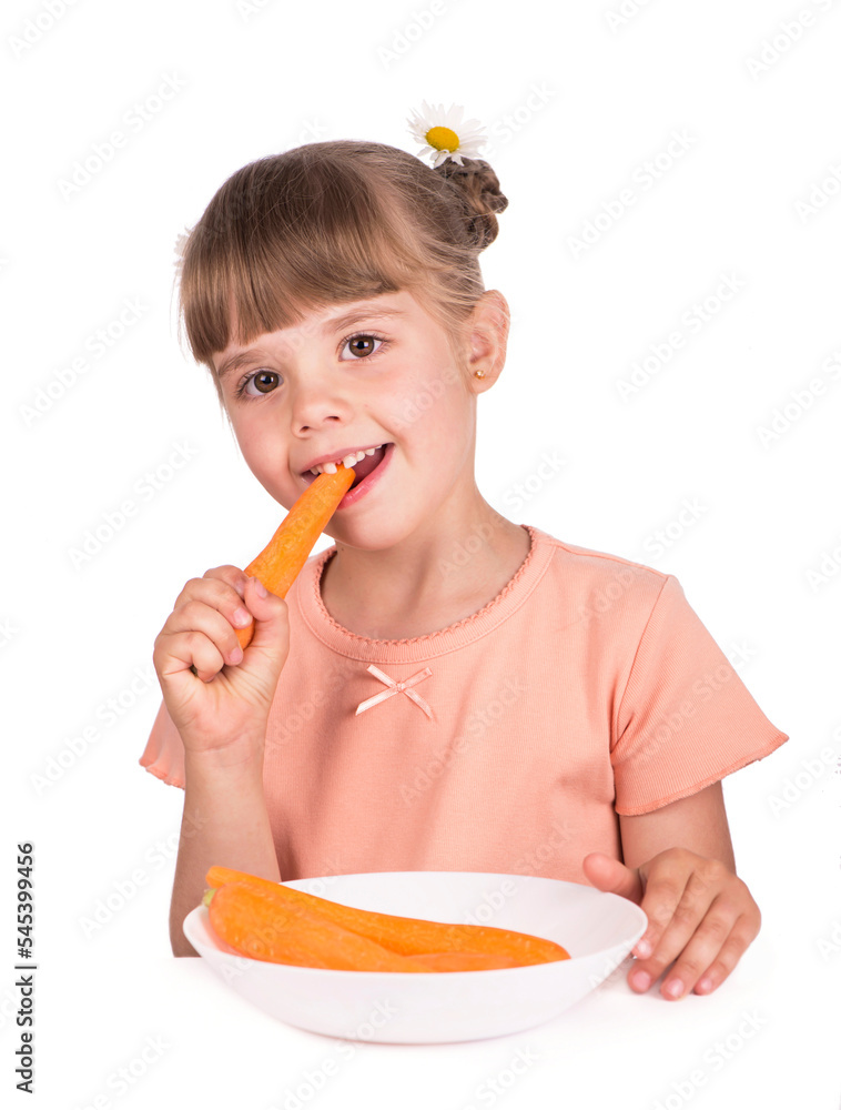 Cute little girl with the carrot on a white background