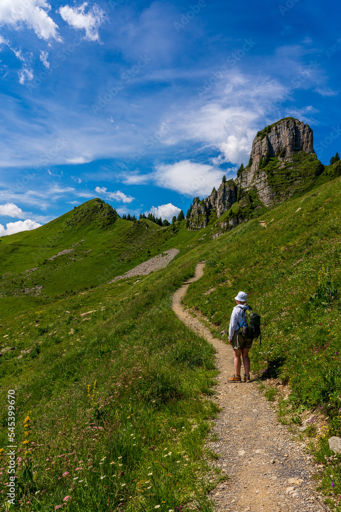 Backpacker in the Swiss mountains.
