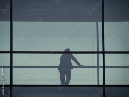 silhouette of a person in a corridor