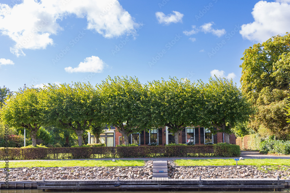 Fototapeta premium Scenic view of small village Briltil, municipality Westerkwartier in Groningen province in the Netherlands