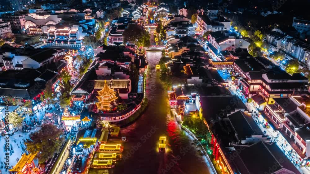Timelapse aerial photography of night view of shuttle cruise ship on Qinhuai River in Nanjing, Jiangsu, China Timelapse aerial photography of night view of shuttle cruise ship on Qinhuai River in Nanjing, Jiangsu, China