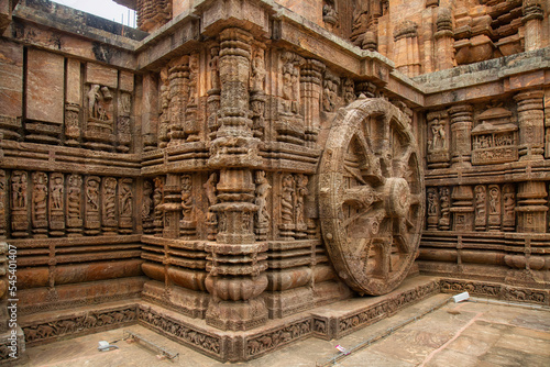 Ancient stone carvings at Konark Sun temple at Pur depicting the chariot of Sun god with a giant wheel. Konark temple is located at Puri in the state of Orissa, India