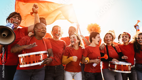 Fotografie Football fans having fun cheering their favorite team - Soccer sport entertainme
