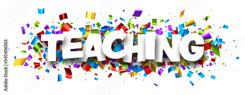 Teaching sign over colorful cut ribbon confetti background. © Vjom