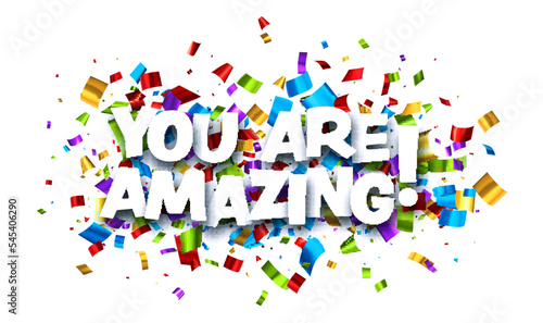 You are amazing sign on colorful cut ribbon confetti background.