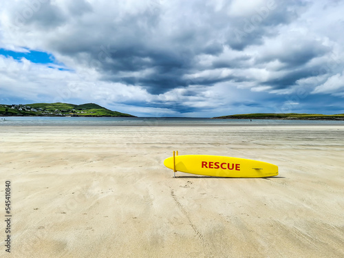 Yellow coast guard rescue surfboard at Narin Beach by Portnoo, County Donegal - Ireland