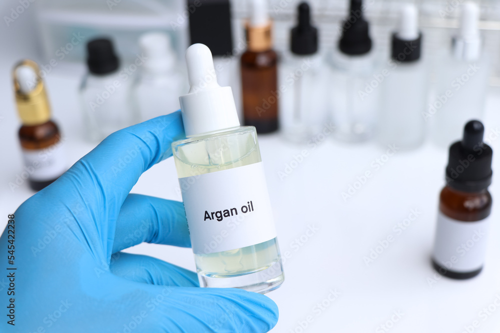 argan oil in a bottle, chemical ingredient in beauty product argan oil in a bottle, chemical ingredient in beauty product