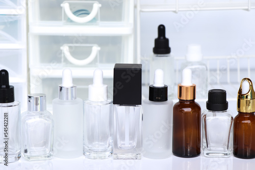 Beauty product bottle or serum bottle on white background