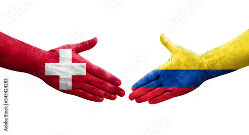 Handshake between Switzerland and Colombia flags painted on hands, isolated transparent image.