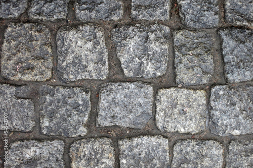 Background of cobblestone pavement, city road
