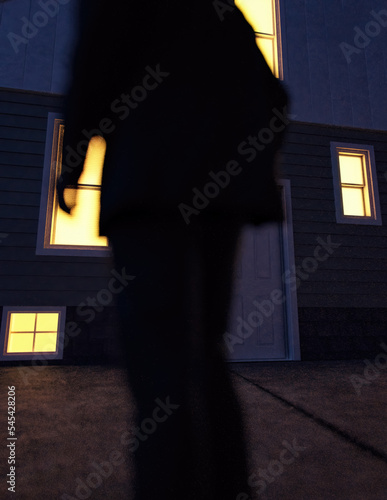 Lone man in suit stands by an illuminated house at dusk. Rear view. 3D render.