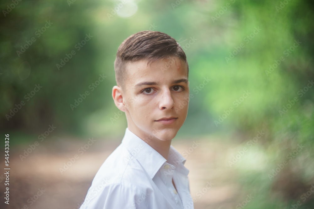 portrait of handsome young man outdoors