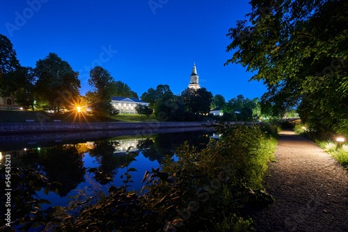Scenic view of Aura river passing through the city of Turku with the Turku Cathedral in the back
