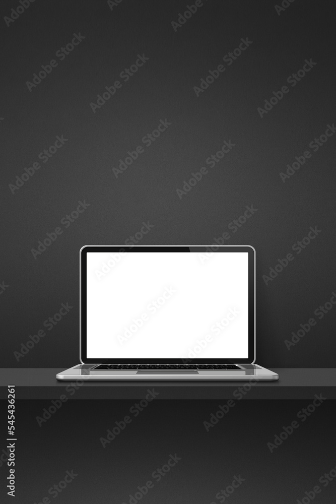 Laptop computer on black shelf. Vertical background Laptop computer on black shelf. Vertical background