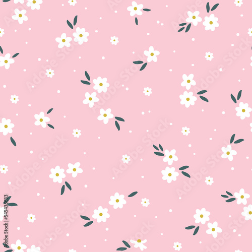 Cute floral pattern. Seamless vector texture. An elegant template for fashionable prints. Print with small white flowers and dots, green leaves. pink background.