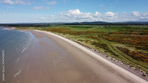 Aerial view of Harlech Beach with lush green vegetation in Scotland photo