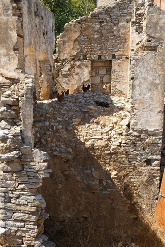 Vertical closeup shot of an ancient ruin in Horio on Symi island, Greece photo